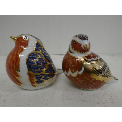 621 - Two Royal Crown Derby bird paperweights with silver and gold stoppers