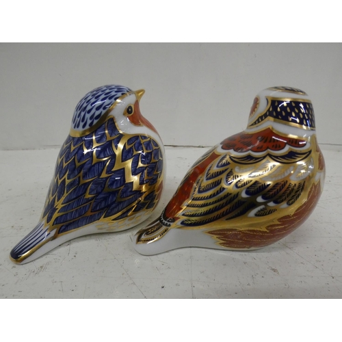 621 - Two Royal Crown Derby bird paperweights with silver and gold stoppers