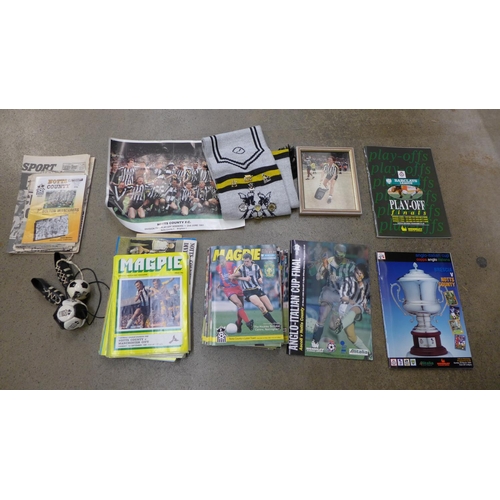 721 - A collection of Notts County football ephemera and items including a scarf with pin badges, magazine... 