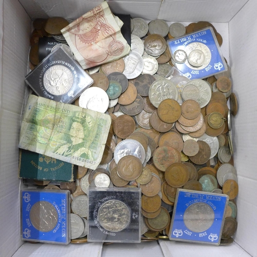 722 - A collection of coins, commemorative crowns, etc.