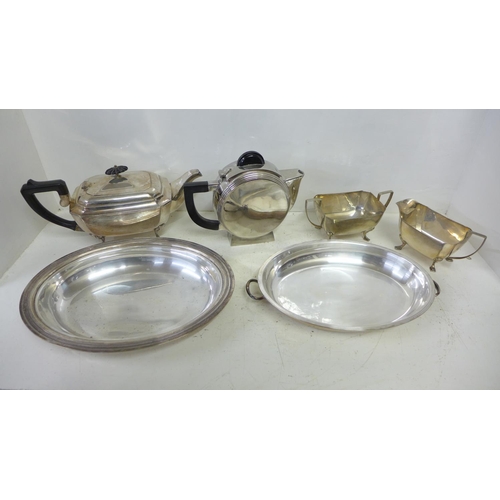 729 - A Cristofle Art Deco teapot, a three piece plated Art Deco tea service and a plated tureen