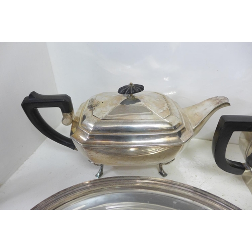 729 - A Cristofle Art Deco teapot, a three piece plated Art Deco tea service and a plated tureen