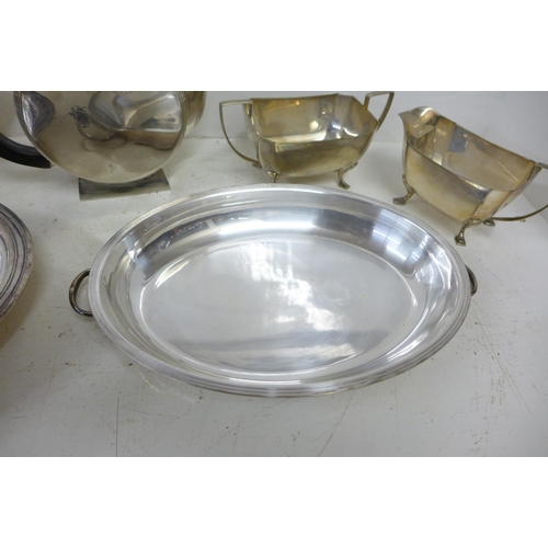 729 - A Cristofle Art Deco teapot, a three piece plated Art Deco tea service and a plated tureen