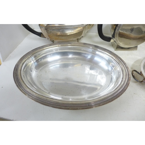 729 - A Cristofle Art Deco teapot, a three piece plated Art Deco tea service and a plated tureen