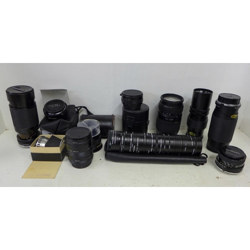 731 - Six camera lenses, filters, etc.