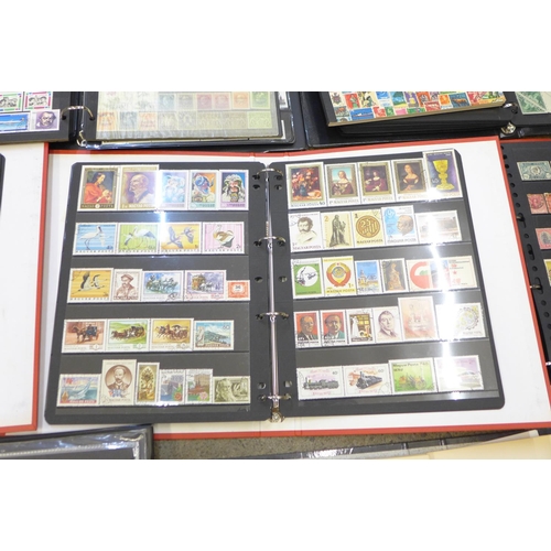 732 - Eight albums of World stamps
