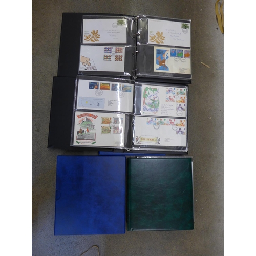 745 - Four albums of first day covers