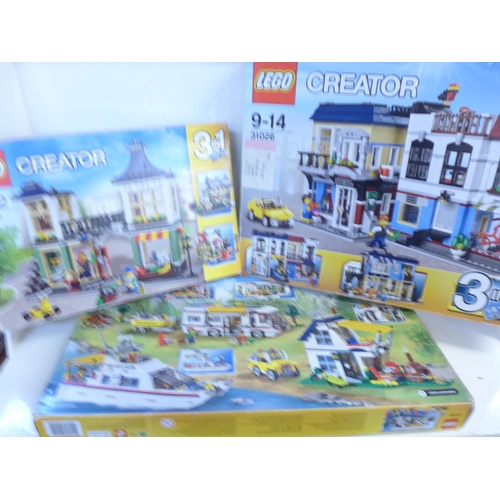 751 - Three Lego sets, boxed (contents unchecked)