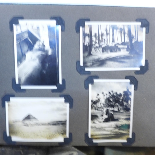 755 - An Army uniform and kit bag and an album of phographs taken whilst on active service in North Africa