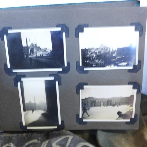 755 - An Army uniform and kit bag and an album of phographs taken whilst on active service in North Africa