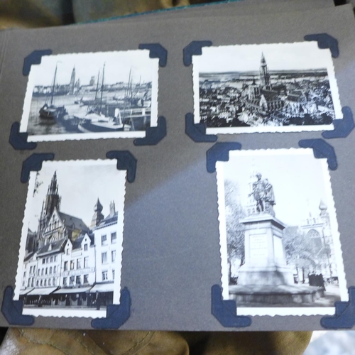 755 - An Army uniform and kit bag and an album of phographs taken whilst on active service in North Africa