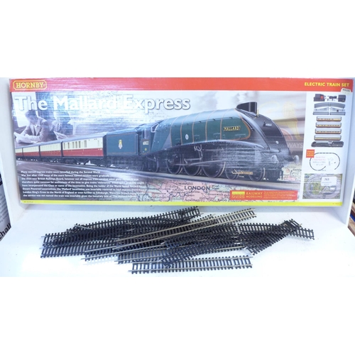 763 - A Hornby Mallard Express train set with track and power supply, etc.