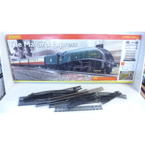 763 - A Hornby Mallard Express train set with track and power supply, etc.