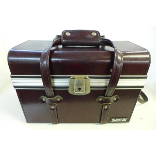 773 - A Canon AE-1 camera with box and accessories including lenses, filters, etc.