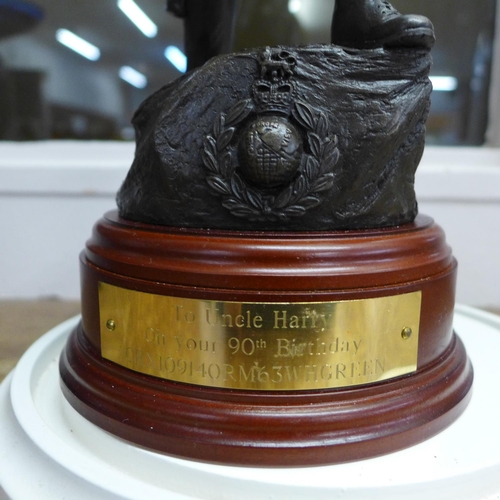 786 - A resin model of a Royal Marine on a wooden plinth with plaque under a glass dome, dome 36cm