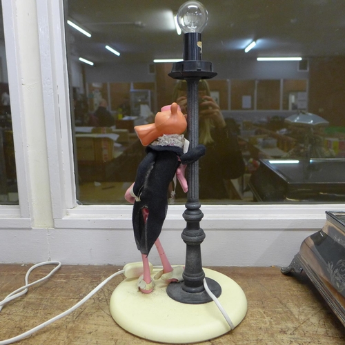 788 - An Italian Pink Panther table lamp (lacking shade)