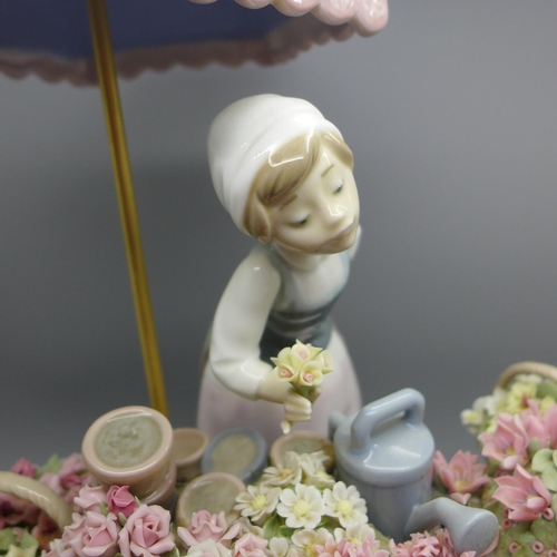 790 - A Lladro Spanish Porcelain - Flowers of the Season (model ref 1454), designed by Jose Puce depicting... 
