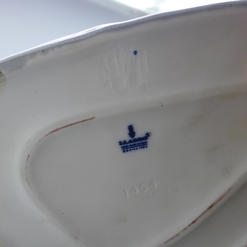 790 - A Lladro Spanish Porcelain - Flowers of the Season (model ref 1454), designed by Jose Puce depicting... 