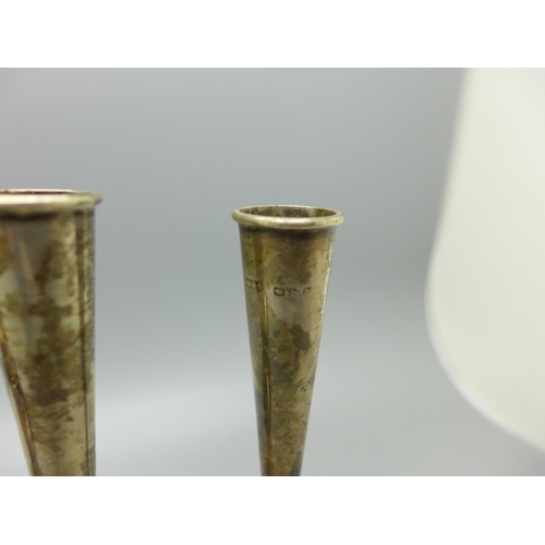 824 - A pair of dwarf candlesticks and a pair of Victorian silver vases