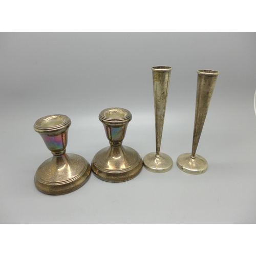 824 - A pair of dwarf candlesticks and a pair of Victorian silver vases