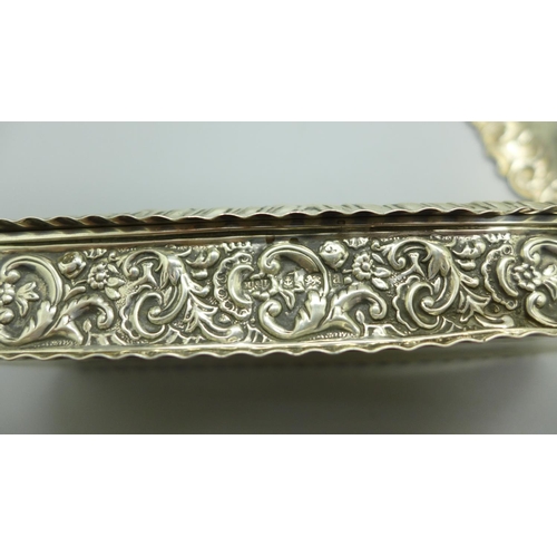 825 - An embossed silver box, Birmingham 1900, 89g, width 13.5cm, and a silver bowl, 76g