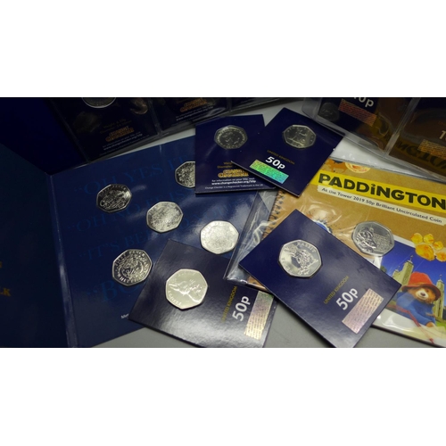840 - Coins including Paddington At the Tower 50p, four Beatrix Potter 50p, etc.