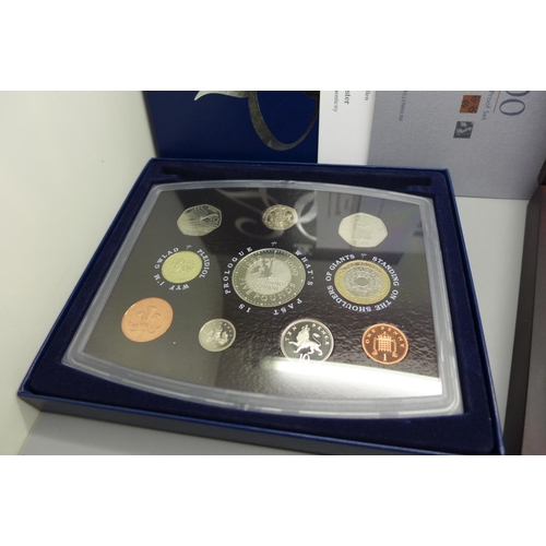 851 - A Royal Mint UK proof coin collection 2000 and a Westminster The Queen's New Portrait Specimen Set, ... 