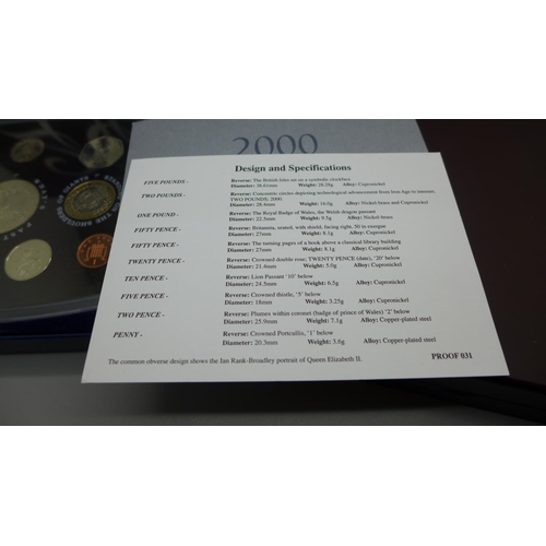 851 - A Royal Mint UK proof coin collection 2000 and a Westminster The Queen's New Portrait Specimen Set, ... 