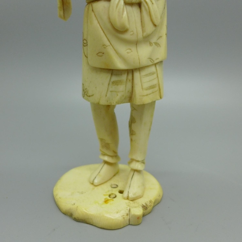 859 - A carved ivory figure with later applied head, a/f
