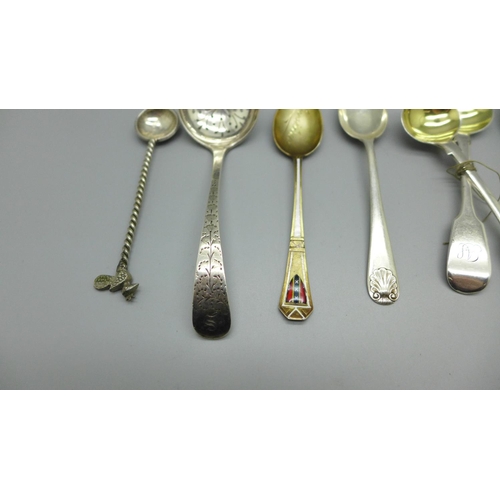 880 - A pair of Victorian silver mustard spoons, Newcastle 1855, Gowland Brothers, a silver sifter spoon, ... 