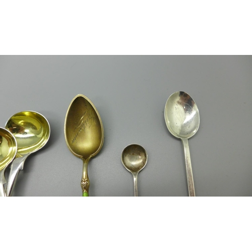 880 - A pair of Victorian silver mustard spoons, Newcastle 1855, Gowland Brothers, a silver sifter spoon, ... 