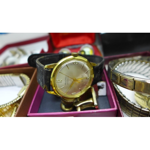 886 - A collection of cufflinks including American Swank eagle, a Paul Jobin wristwatch, shirt sleeve susp... 