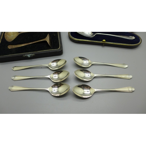 899 - A silver spoon, cased, a silver spoon and pusher and a set of six silver spoons, 120g