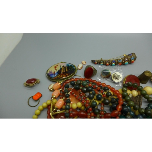 903 - Coloured beaded necklaces, rings, unmounted cameos, brooches, etc.