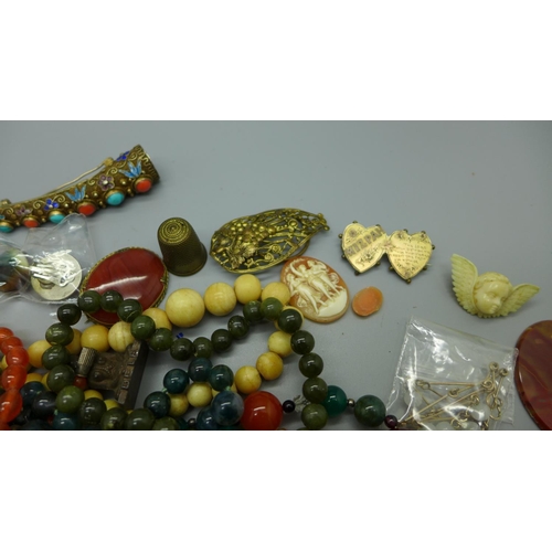 903 - Coloured beaded necklaces, rings, unmounted cameos, brooches, etc.