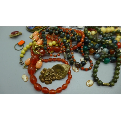 903 - Coloured beaded necklaces, rings, unmounted cameos, brooches, etc.