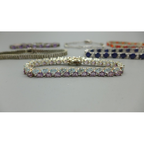 905 - Five silver bracelets set with gemstones