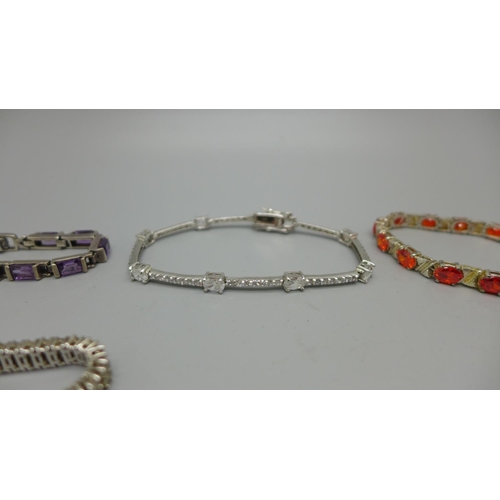 905 - Five silver bracelets set with gemstones