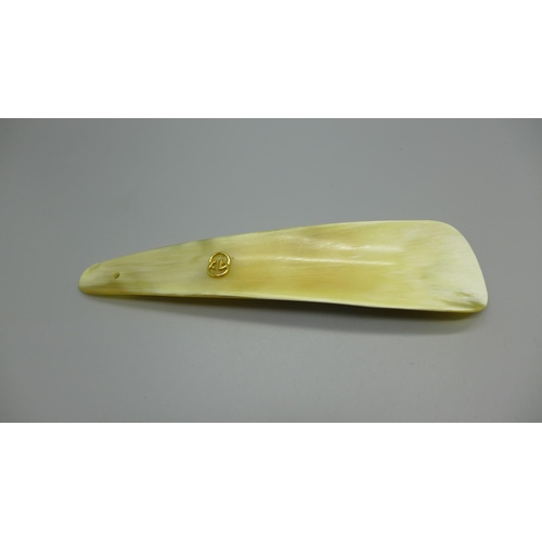 926 - A vintage Gucci shoe horn, horn with gold coloured logo, with original box