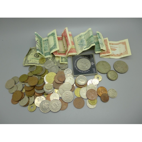 932 - A collection of coins and banknotes, including commemorative coins and a US $1 note