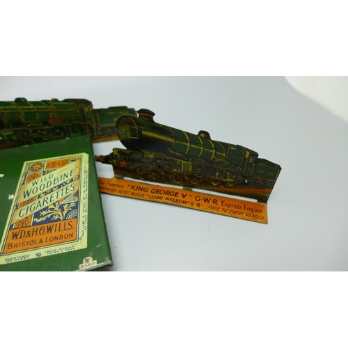 933 - A tin-plate Wills's Woodbine Cricket Game and four tin-plate locomotive plaques