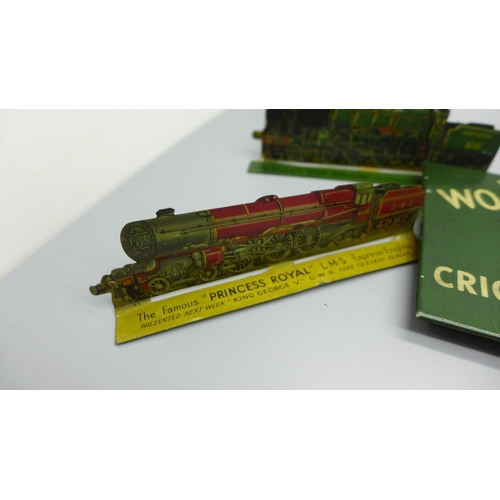 933 - A tin-plate Wills's Woodbine Cricket Game and four tin-plate locomotive plaques