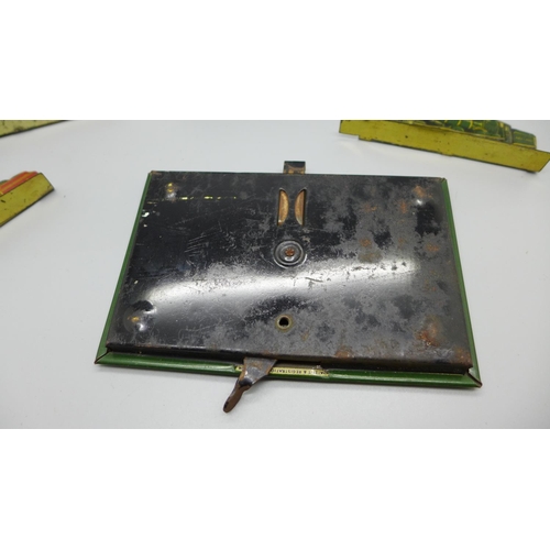 933 - A tin-plate Wills's Woodbine Cricket Game and four tin-plate locomotive plaques