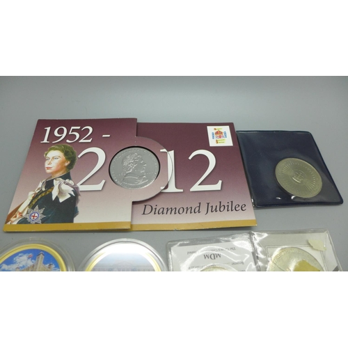 944 - Coins including three £5 coins, commemoratives, etc.