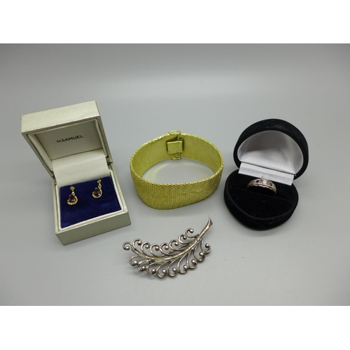 946 - A pair of 9ct gold and garnet earrings, a silver, opal and sapphire ring, a Danecraft silver brooch ... 