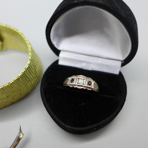 946 - A pair of 9ct gold and garnet earrings, a silver, opal and sapphire ring, a Danecraft silver brooch ... 