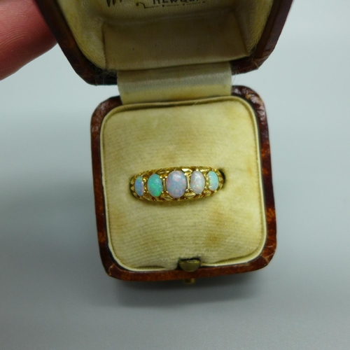 953 - A Victorian 18ct gold and opal ring, Birmingham 1864, two opals chipped, 2.6g, K