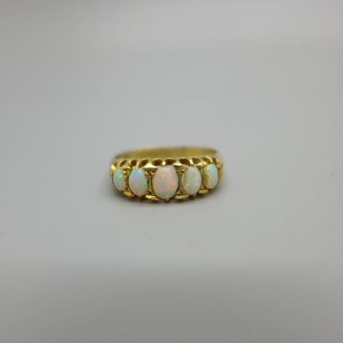 953 - A Victorian 18ct gold and opal ring, Birmingham 1864, two opals chipped, 2.6g, K