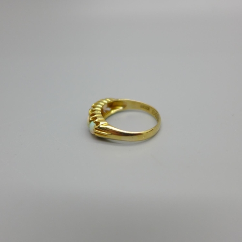 953 - A Victorian 18ct gold and opal ring, Birmingham 1864, two opals chipped, 2.6g, K