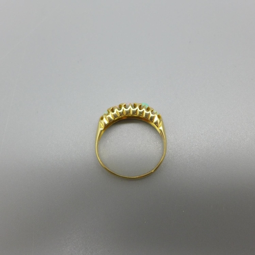 953 - A Victorian 18ct gold and opal ring, Birmingham 1864, two opals chipped, 2.6g, K